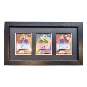 PSG memorabilia display with Barcola, Ramos and Dembele autographs