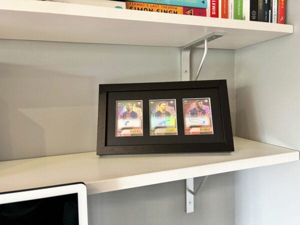 PSG memorabilia black display with Barcola, Ramos and Dembele autographs standing up using optional leg stand