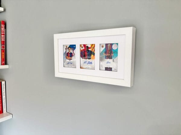 Barcelona memorabilia display, white frame, hanging on wall, three autographs from Victor, Rivaldo and Olmo
