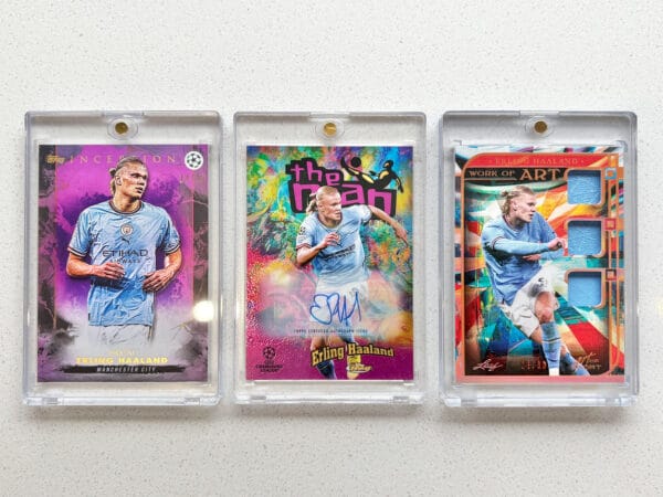 Erling Haaland autograph, relic and numbered, three sports cards from front