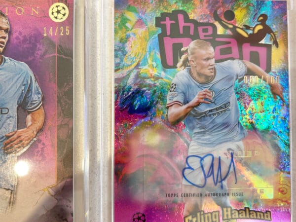 Erling Haaland sports cards close up showing the numbered parts